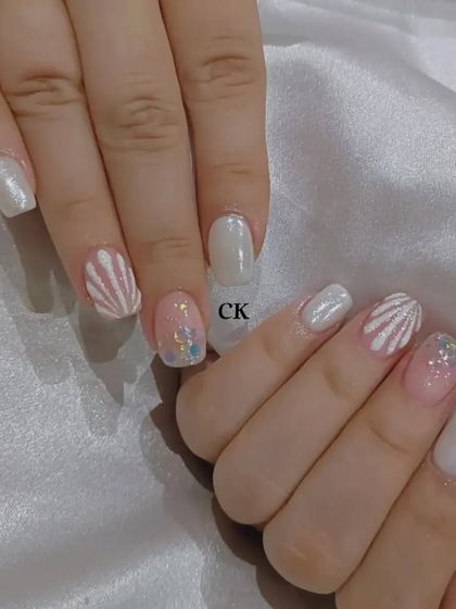 Another view of the white and pink shell design.