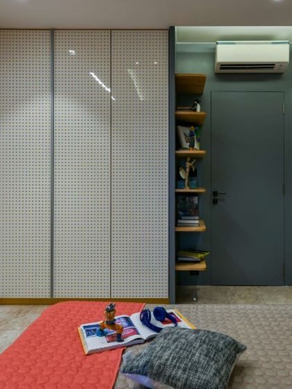 This playful room for two little brothers is bursting with happy energy. I balanced bright pops of sunflower yellow with calming grey for a look that's fun now and will grow with them.