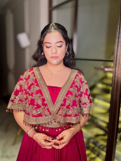 A close-up of the soft, shimmery eye makeup and the flawless skin.