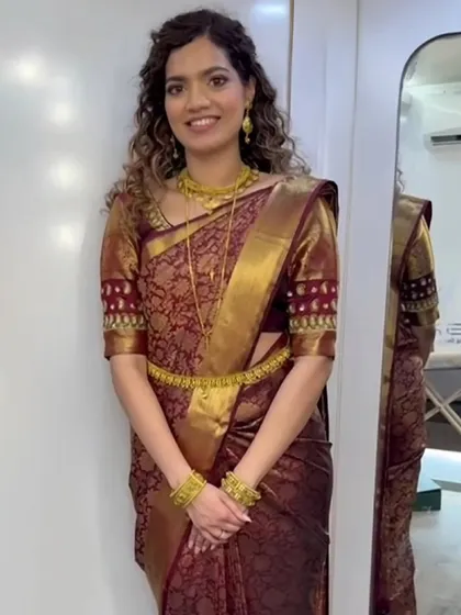 Draped in her Manthrakodi, the traditional saree for a Kerala Christian bride. I ensured the drape was elegant and graceful as she stepped into her new life.