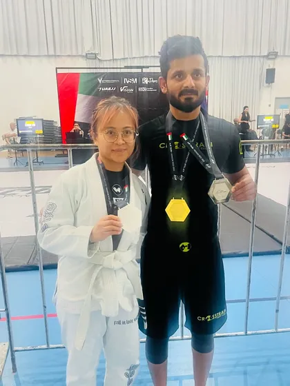 Teammates celebrating their victories together at an international AJP tournament. We win together, we grow together.