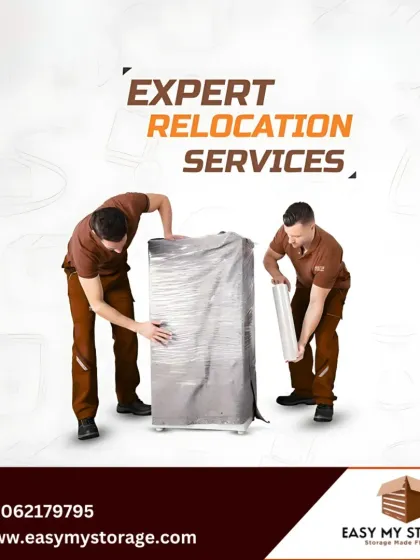 Our expert relocation services include meticulous packing. Here, our team is shown carefully wrapping a large appliance, demonstrating the professional care we take to protect your valuables.