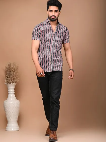 The men's short-sleeve shirt from the striped couple set, perfect for a smart casual look.