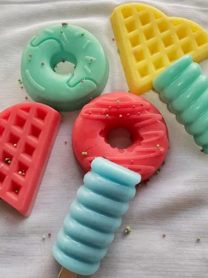 Bath time should be fun. My dessert-inspired soaps, like these colorful donuts, waffles, and popsicles, are a huge hit with kids and make for delightful and practical gifts.