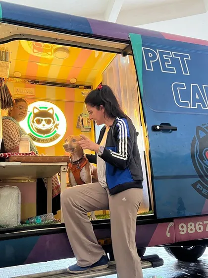 We're thrilled when celebrity pet parents like actress Shruti Seth trust us with their furry family members. Here she is with her dog Mo, right at our mobile grooming station.