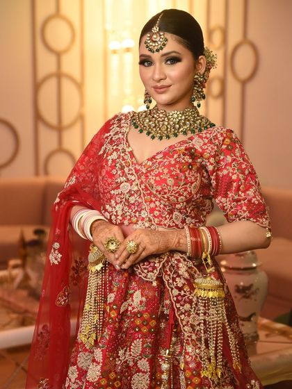 The full bridal look, from the statement jewellery to the kaleeras. This image shows how all the elements come together for a stunning wedding day appearance.