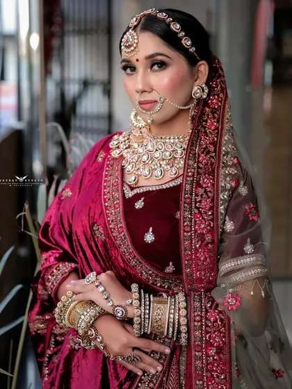 A classic portrait pose, with the bride looking directly at the camera, exuding confidence and grace.