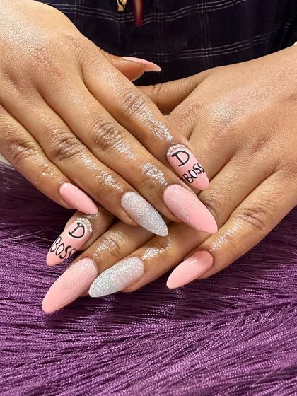 A fun custom set for a fan of the actor Darshan. I hand-painted "D Boss" on the nails as requested by the client.