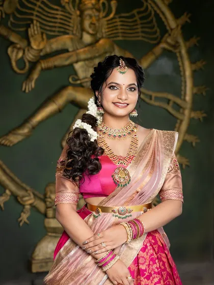 A beautiful smile from this gorgeous client. For her traditional event, I created a look with a pop of pink on the lips to match her half-saree.