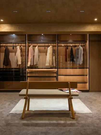 Additional views of the Gala showroom, showcasing the luxurious walk-in closet displays, the reflective marble floor, and the seamless integration of product showcases into the architectural design.