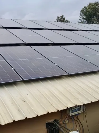 Another view of the 106 kWh solar installation on the hotel's metal-sheet rooftop. Our team is experienced in installing systems on various roof types, ensuring secure and efficient mounting.