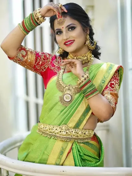 A series of photos showing a bride in a green saree with our stunning temple jewellery. The different poses highlight the choker, haram, bangles, and maang tikka.