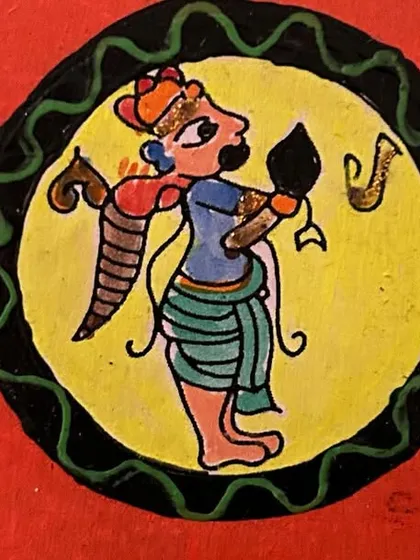 A hand-painted coaster showing a figure with a bow and arrow, rendered in the traditional Ganjifa folk art style. Each coaster is a small tribute to this historic art form.