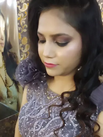 A close-up of a party makeup look. The focus is on a soft brown smokey eye and a subtle pink lip, a versatile look for any occasion.