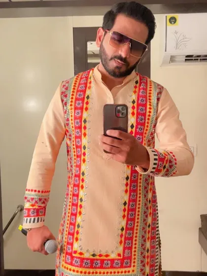 Kicking off the Navratri festival with a vibrant, multi-colored embroidered kurta. It's a look that's full of energy and sets the tone for the celebrations to come.