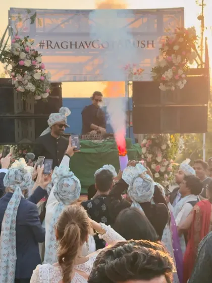 My 'DJ on Wheels' setup is how we turn a traditional baraat into a full-blown moving party. Here, you can see the groom's procession transformed into an unforgettable celebration right on the street, complete with CO2 jets and non-stop music.