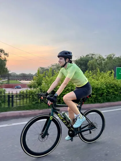 A rider enjoying the golden hour light during an evening spin.