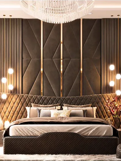 For this master bedroom, we crafted a sanctuary of opulence. A floor-to-ceiling, custom-quilted headboard with geometric brass inlays and integrated lighting creates a dramatic and sophisticated focal point, showcasing our expertise in bespoke bedroom design.