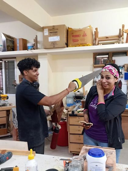 It's not all serious work. There's always time for some fun and games in the workshop, especially after a heavy biryani lunch.