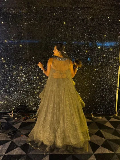 A back view of my gown against the sparkling, starry backdrop.