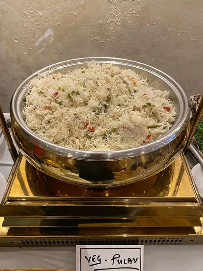 Our Veg Pulav is a fragrant rice dish cooked with assorted vegetables and mild spices. It serves as the perfect, light accompaniment to our rich and flavorful curries.