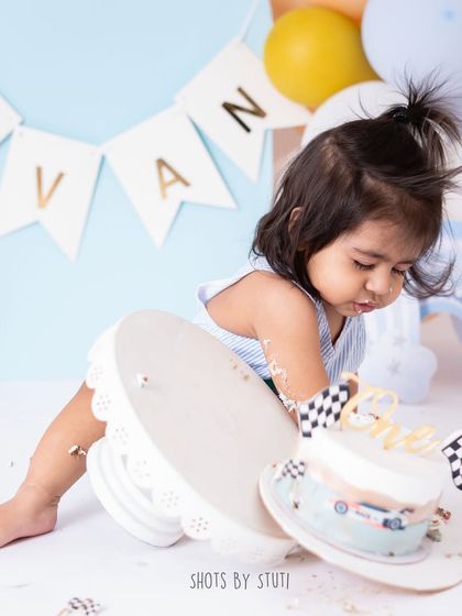 The cake stand has been successfully toppled. Toddler sessions are all about embracing the chaos and capturing the funny, real moments as they happen.