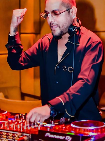 Pumping up the energy at The Fixx. A good DJ feels the crowd's pulse and responds with the perfect track to take the night to the next level.