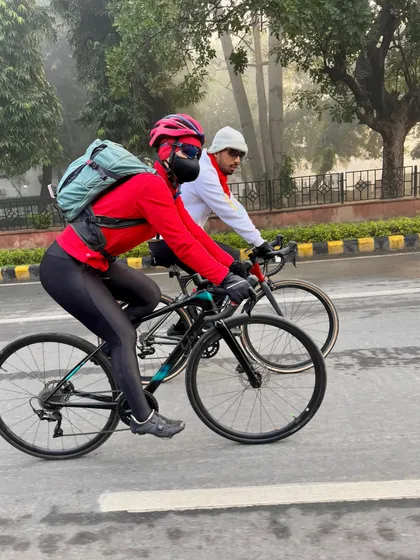 A rider with a backpack, likely filled with items for distribution during our charity event.