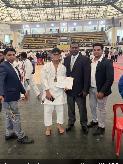 Sudokann Martial Arts - Competitive Karate Training Our Champions on the Podium photo 17