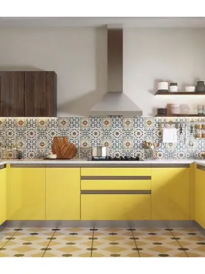 A U-shaped kitchen that makes a statement with cheerful yellow cabinets and a patterned tile backsplash. This layout provides an efficient work triangle and plenty of counter space, perfect for busy home cooks.