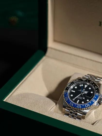 This is how your grail arrives. The watch is perfectly seated in its authentic Rolex presentation box, a key part of the full set we promise with every luxury watch resell.