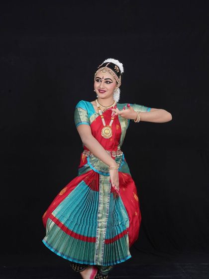 A portrait of my student, Tara Arigela. The choice of a beautiful silk sari and authentic jewelry is a collaborative process to ensure the dancer feels her absolute best on her special day.