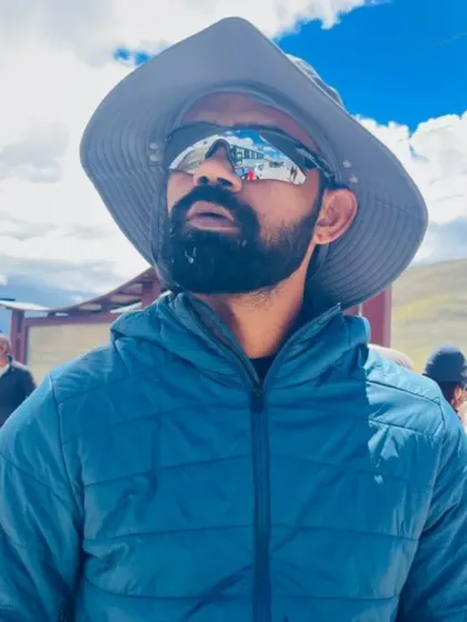 A moment of reflection, taking in the crisp mountain air and the powerful vibrations of the land.