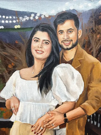 A close-up of a couple's portrait with a beautiful, softly lit background. This painting makes for a wonderful anniversary or birthday gift.