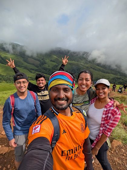Our trek lead takes a selfie with a happy group of trekkers at Netravathi.