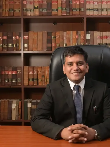A professional portrait in my office. As a first-generation lawyer, building this practice has been a journey of perseverance and dedication.