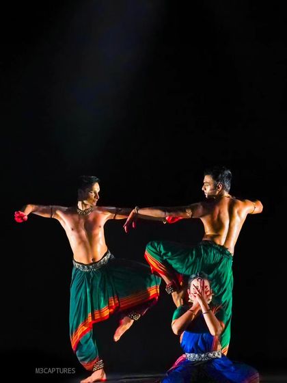 A complex formation from 'Nagamandala', where the dancers' bodies are intertwined to tell the story. This type of physical storytelling is a hallmark of our Punyah Dance Company productions.