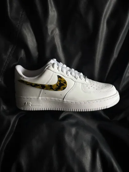 A side profile of the leopard swoosh custom sneaker.