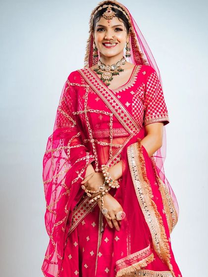 A happy bride is the most beautiful bride. This photo captures the joy of wearing the perfect outfit on your wedding day.