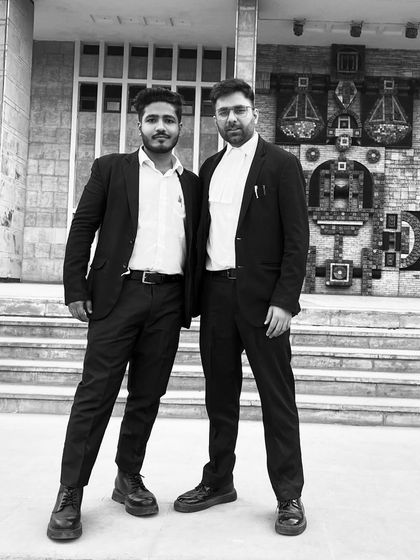 With a colleague. In the face of legal challenges, we stand together with confidence and resolve.