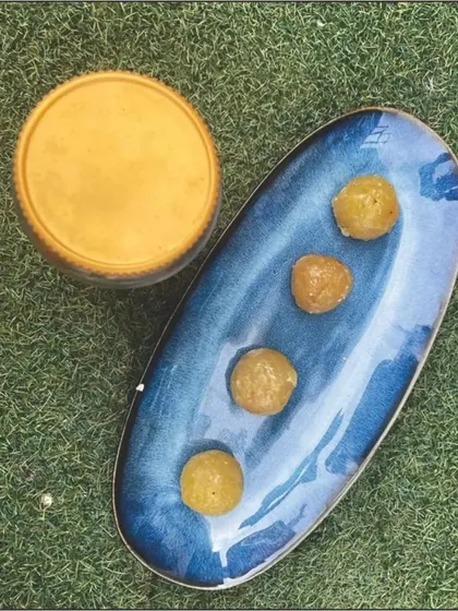 An aerial view showing our Dry Amla Murabba served on a platter. This is a simple and healthy dessert to enjoy after a meal or as a sweet snack.