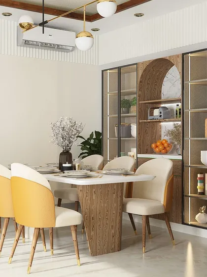 A different perspective of the DLF dining area, showing an alternate chair color option in yellow. The arched niche and integrated lighting in the crockery unit add a touch of architectural elegance.