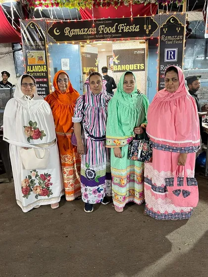 A group of ladies looking beautiful in their traditional outfits.