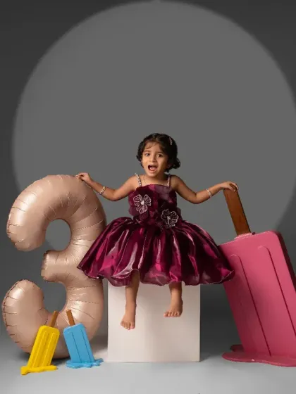 Childhood is pure, energetic joy! We love creating fun, playful setups like this ice cream theme to let your toddler's personality shine. This little one's excitement was absolutely infectious.