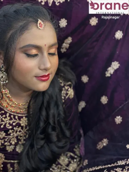 A side view of the traditional makeup demo, showing the soft curls and braided details in the hair.