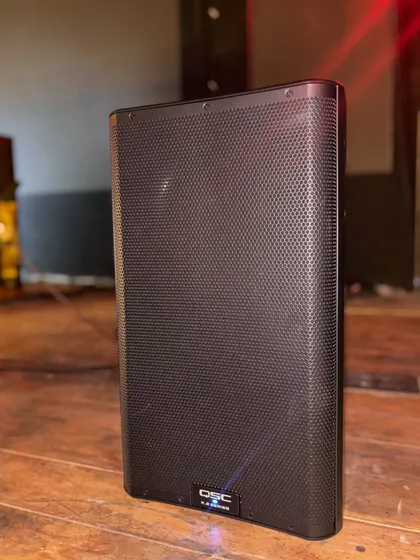 The QSC K12.2 active speaker, a powerhouse of sound we installed for a club in Delhi. This speaker delivers clear, punchy audio that can fill a room without distortion, crucial for both live music and DJ sets.