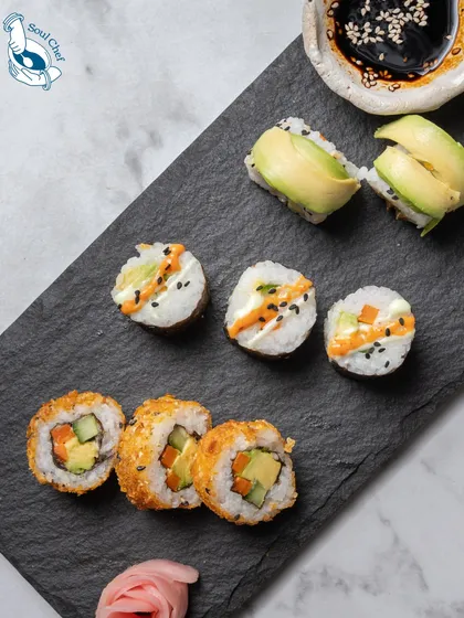 Sushi is a fantastic option for a light and elegant appetizer. I offer a variety of rolls, including these classic avocado and crispy vegetable options, all made with perfectly seasoned rice and fresh ingredients.