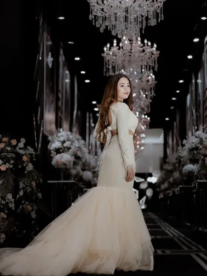 A back view of the beautiful white gown, showing the elegant tie-up detail. Every angle of this outfit was picture-perfect.