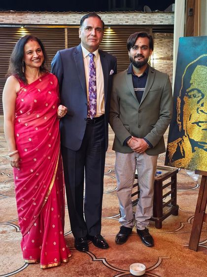 With LT General Dhiraj Seth and his wife, standing beside the glitter portrait I created for him. This piece was a tribute to his service in the Indian Army.