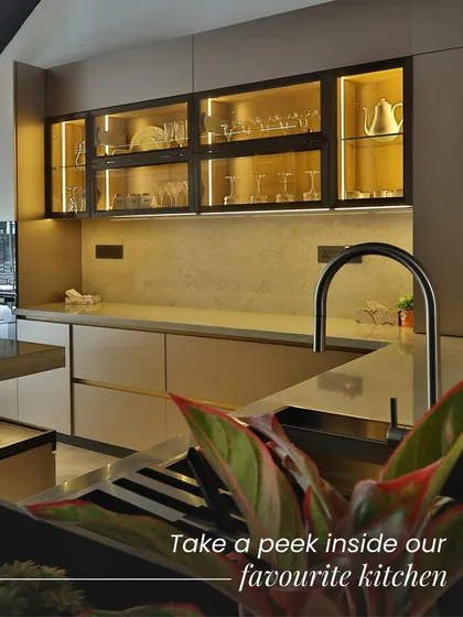 Take a peek inside one of our favorite kitchen projects. The warm, under-cabinet lighting highlights the beautiful glassware, while the sleek, modern faucet and minimalist cabinetry create a space that is both inviting and impeccably stylish.